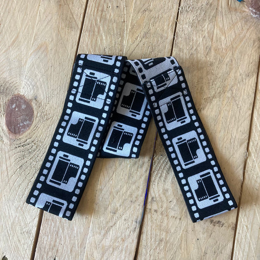 Skateboard Sling - Film Trucks